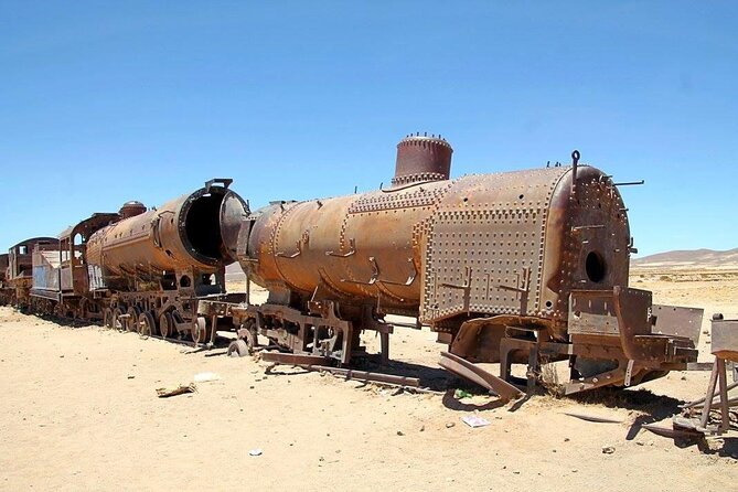 3-Day Uyuni Salt Flat Tour with Sunset and Red Lagoons - Day one: locomotives, salt crafts, and the Salar de Uyuni