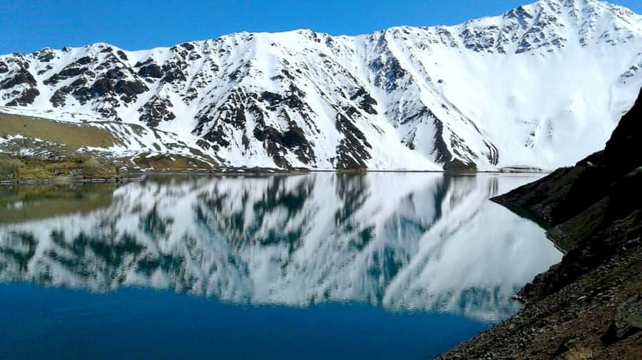 Andes Day Lagoon: Embalse El Yeso Tour from Santiago - Reaching the high waters of Embalse El Yeso