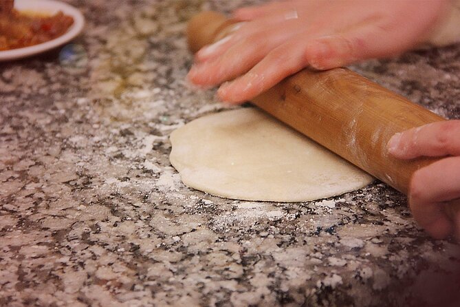 BA: Empanadas and Alfajores Cooking Experience in Palermo - Making empanadas in Palermo