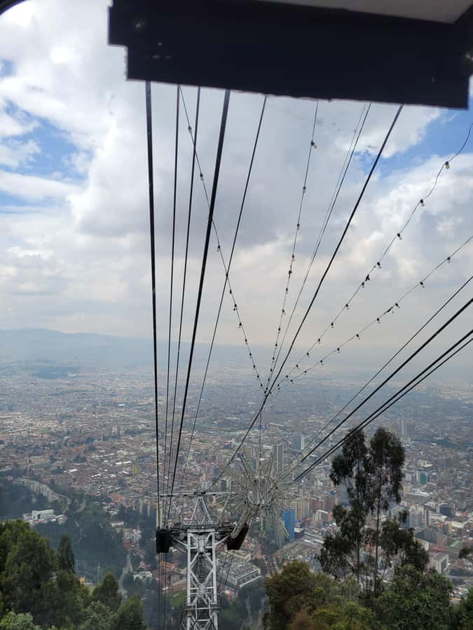 Bogotá: City Tour, Monserrate, Gold Museum, Plaza de Bolivar - Reading Bogotá at Plaza de Bolívar