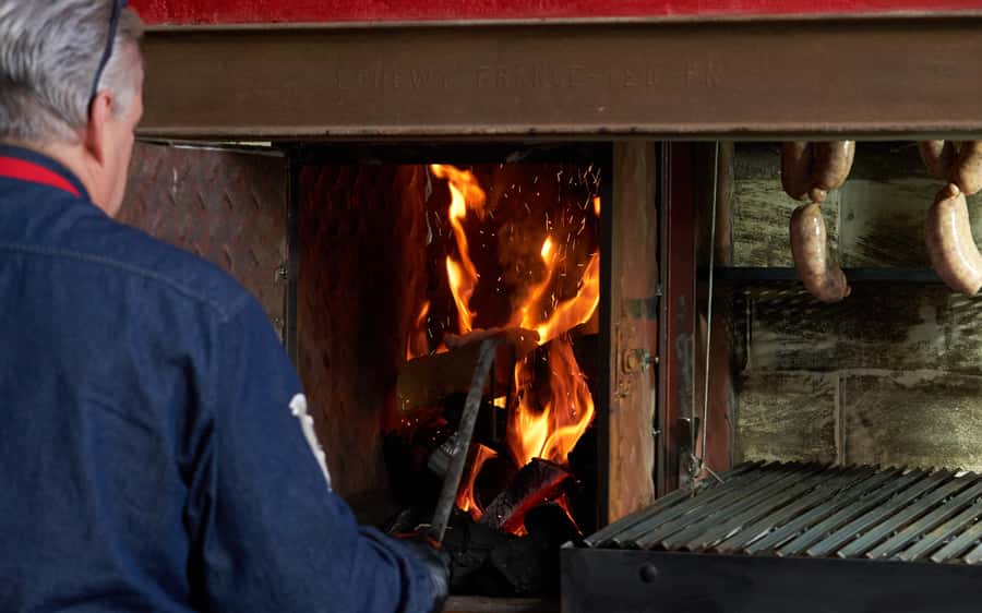 Buenos Aires: Join a Local Family for an Argentine Barbecue - The eight-course meal, from empanadas to Fernet Cola