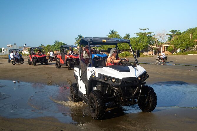 Cartagena ATV Buggy and Horseback riding Beach and Barrio Tour - Seeing a Cartagena fishing barrio by buggy