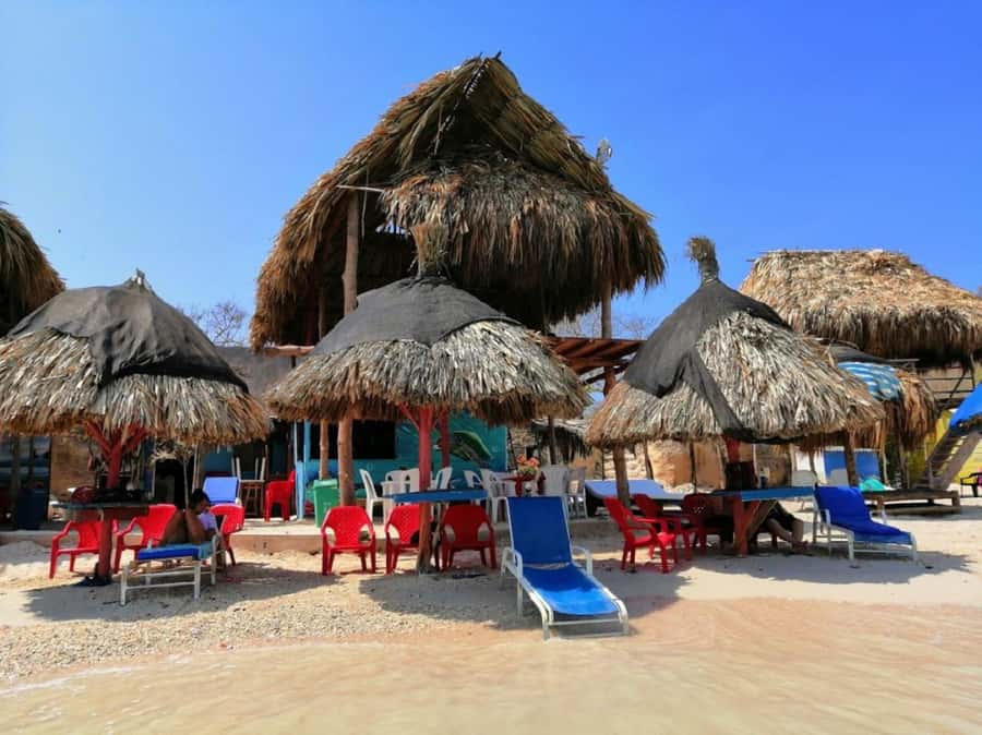 Cartagena: BEACH DAY ON TIERRA BOMBA ISLAND PUNTARENA - Lunch with coconut rice and patacón