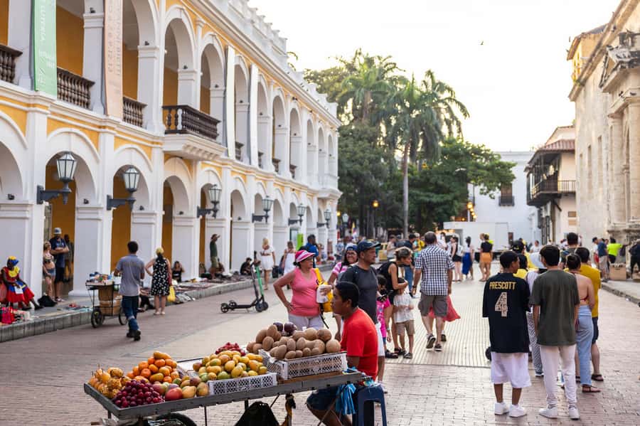 Cartagena: Guided Street Food Tour with Tastings - Starting at Plaza Cervantes and entering the Walled City