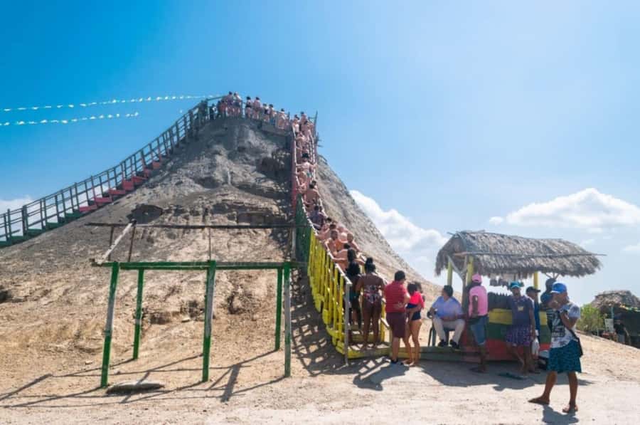 Cartagena: Mud Volcano Tour with Lunch, Pool, and Beach - Getting into the mud and getting clean