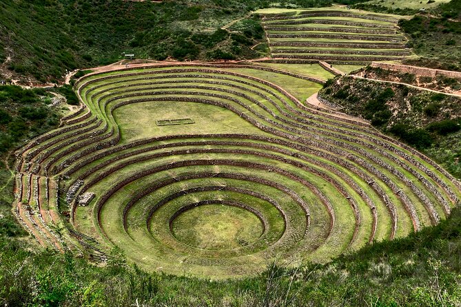 Complete Sacred Valley Tour Small group Pisac, Maras, Moray & Ollantaytambo - Maras salt pools: a bright mountainside stop