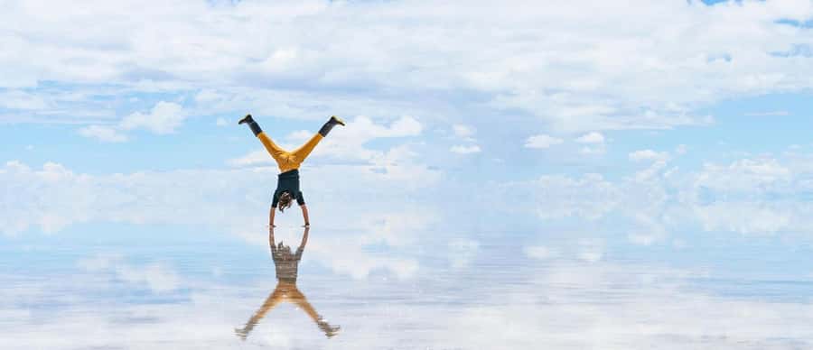 From La Paz: Uyuni Salt Flats 2-Day Tour with Bus Transfers - Entering the white expanse of the Salar de Uyuni