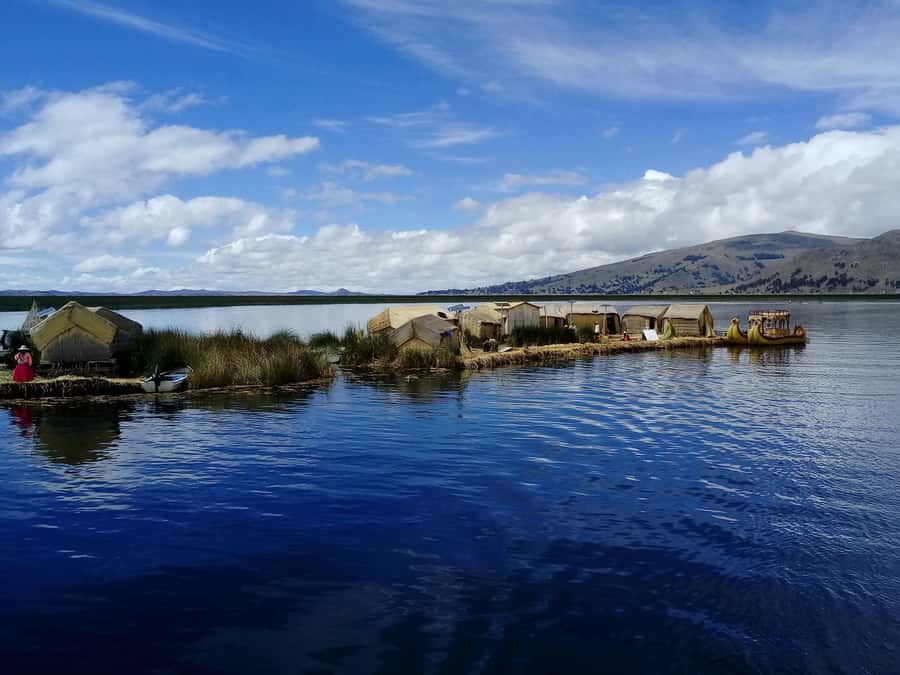 From Puno: Floating Islands of the Uros Half-Day Tour - The extra reed boat ride