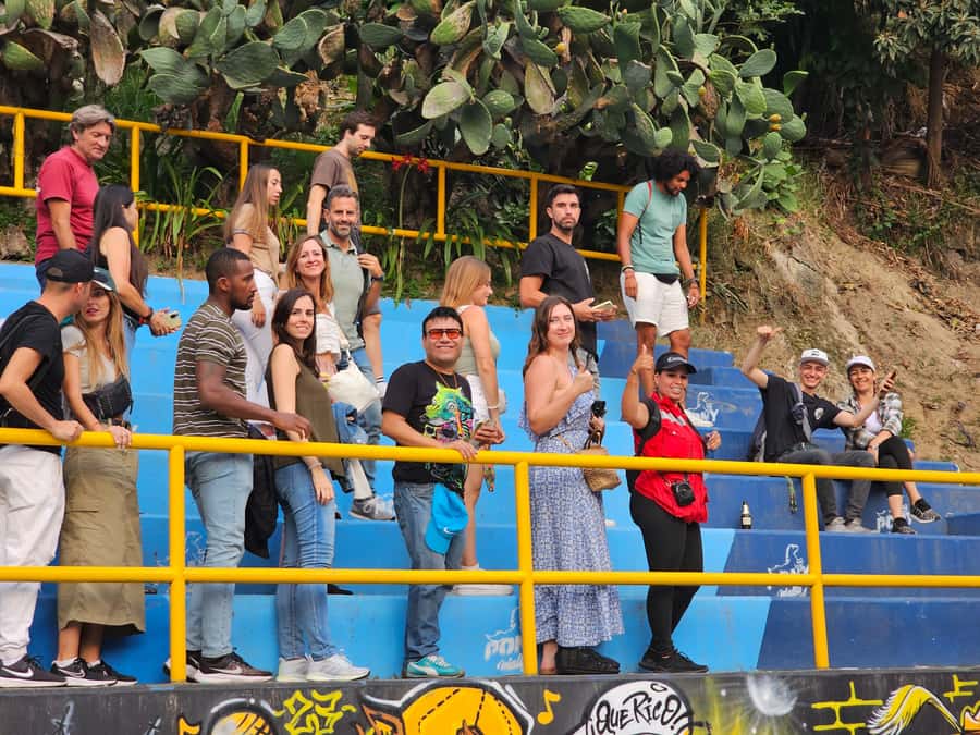 Graffiti Tour comuna 13 and cable car (made by local guides) - Taking the bus into the 20 de Julio neighborhood