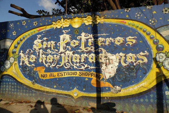 La Boca, a collective creation: Port, immigrants, arts and football - Football, identity, and the walk to La Bombonera
