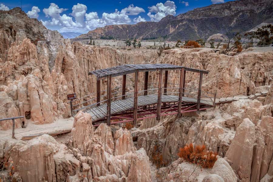 La Paz City Tour and Moon Valley - A salteña before the ride south