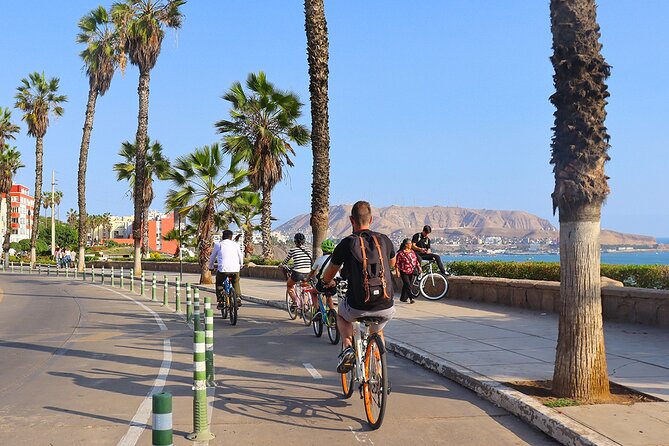 Lima Bike Tour in Miraflores & Barranco - Shared small group - Crossing into Barranco and seeing Víctor Delfín’s studio