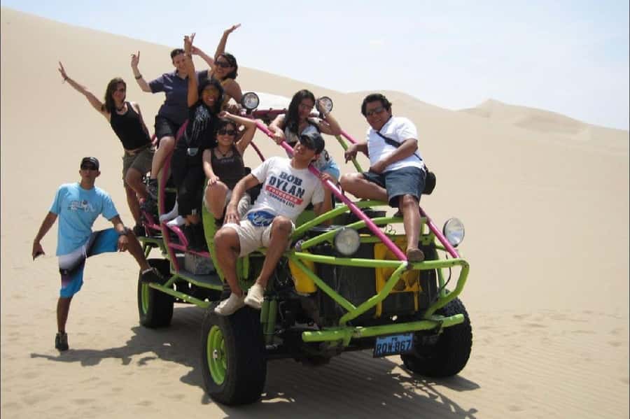 Lima: Paracas and the Huacachina Oasis Guided Day Tour - Lunch, pisco, and the Ica table