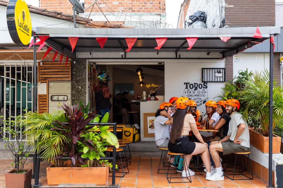 Medellín: E-bike and Foodie Tour - Parque Belén: food, stories, and ordinary public life