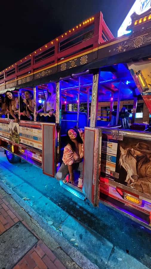 Medellin: Party Bus with DJ & Street Food Tastings - Starting in El Poblado with food on the way