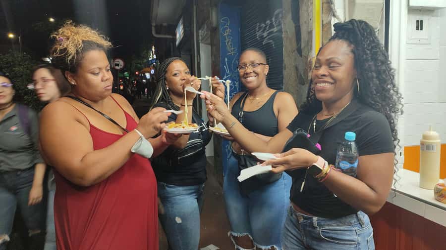 Medellin: Street Food and Poblado Rooftop Tour with a Local - Meeting vendors and seeing the people behind the food