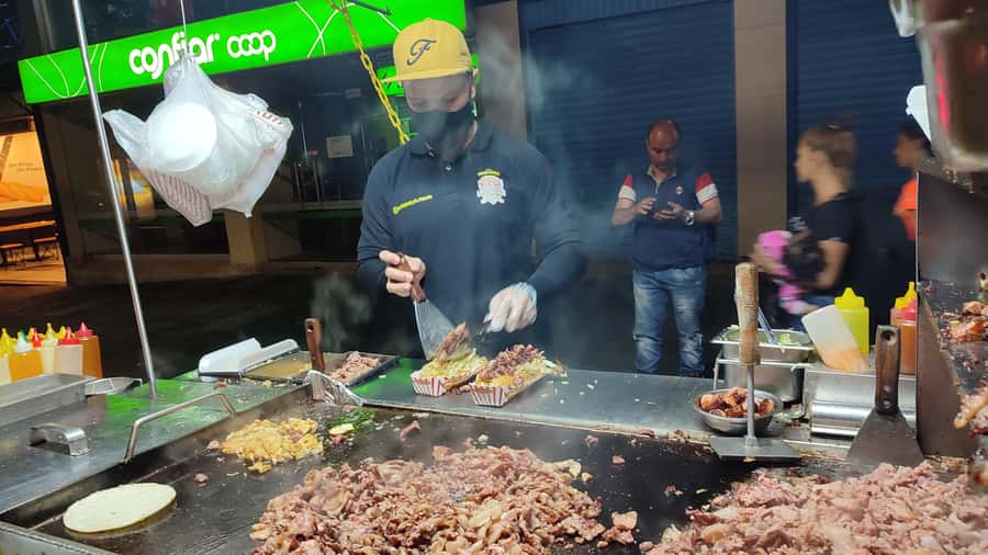 Medellin: Street Food and Poblado Rooftop Tour with a Local - Five Colombian street foods, not just one sample