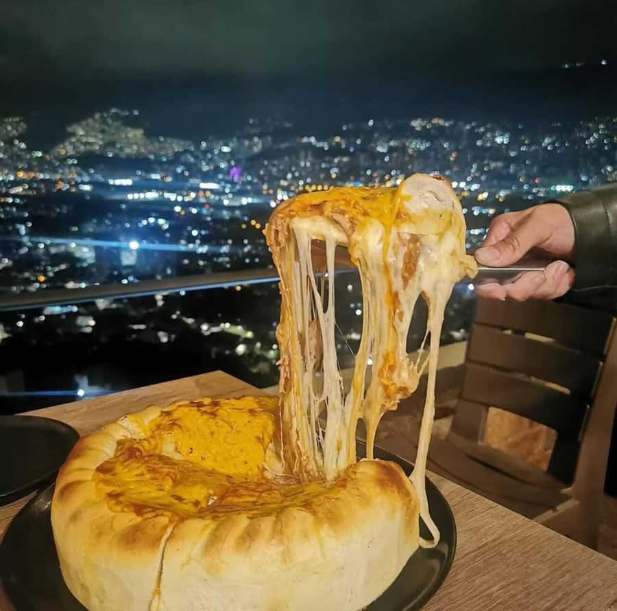 Medellin: tasting Street Food with Rooftops of El Poblado - Envy Rooftop: the evening changes pace