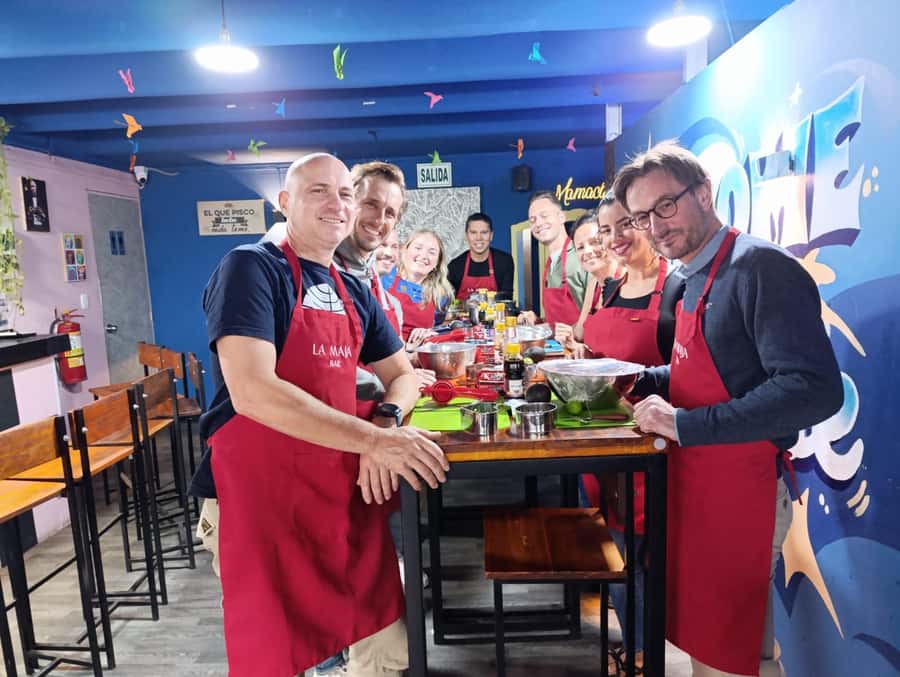 Miraflores: Amazing Peruvian Cooking Class Ceviche Seafood and Pisco Sour - A Peruvian food class with a cocktail bar at its center