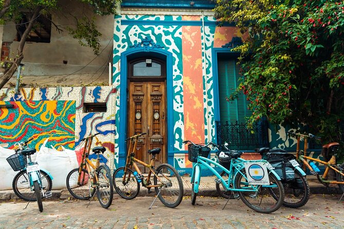 Private Off the Beaten Path: Hidden Urban Art Bike Tour - Pasaje Lanín turns a quiet street into public art