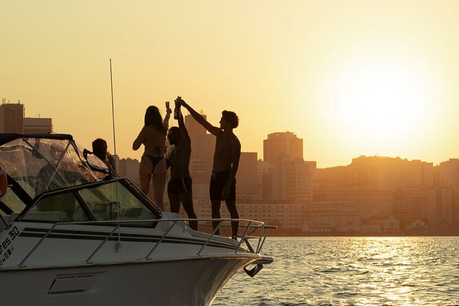 Sunset Boat Tour with Beer, Water, Soda and Snacks included - An hour at Adão e Eva Beach