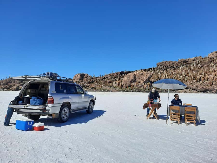 Uyuni tour express from La Paz by bus - Perspective photos, sunset, and the cold